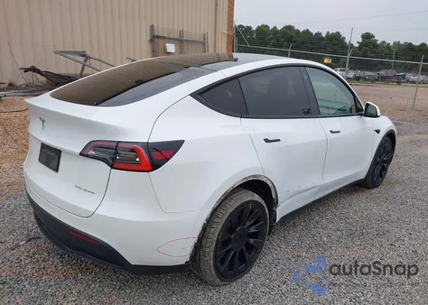 2021 Tesla Model Y Long Range Dual Motor All-Wheel Drive z USA, uszkodzony, nr VIN 5YJYGDEE4MF084857